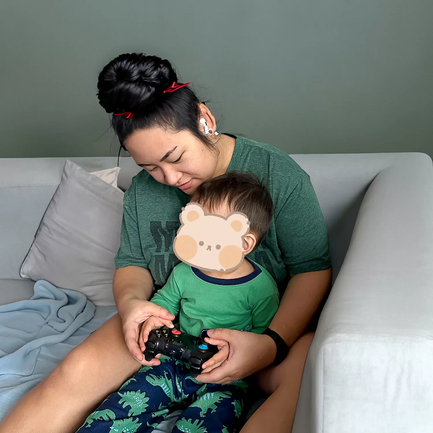 Camille Orfao playing nintendo switch with son Adriano